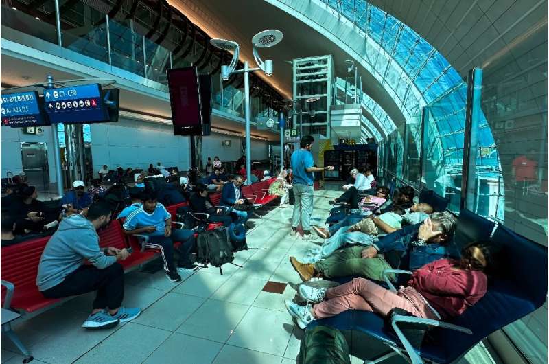 Dubai Flooding: Record Rainfall Causes Road & Airport Disruptions