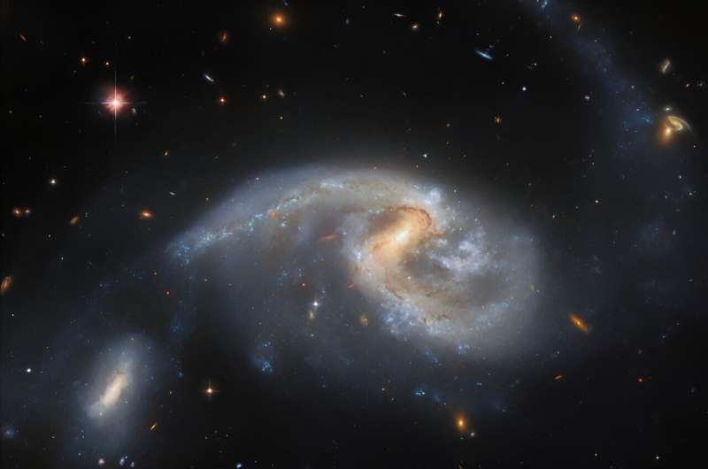 Hubble s Stunning View of Arp 72: Two Galaxies in Close Interaction