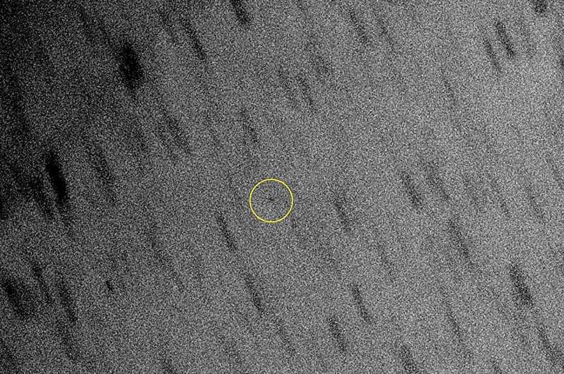 Subaru Telescope Detects Faintest Moon Orbiting Icy Giant Planets