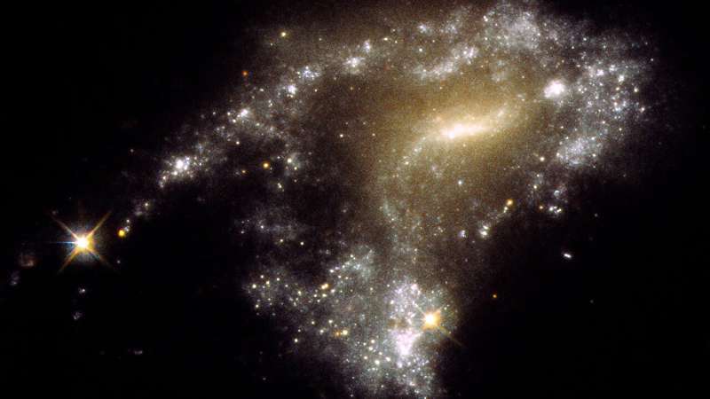 Hubble Reveals Stunning  String of Pearls  Star Clusters in Galaxy Collision