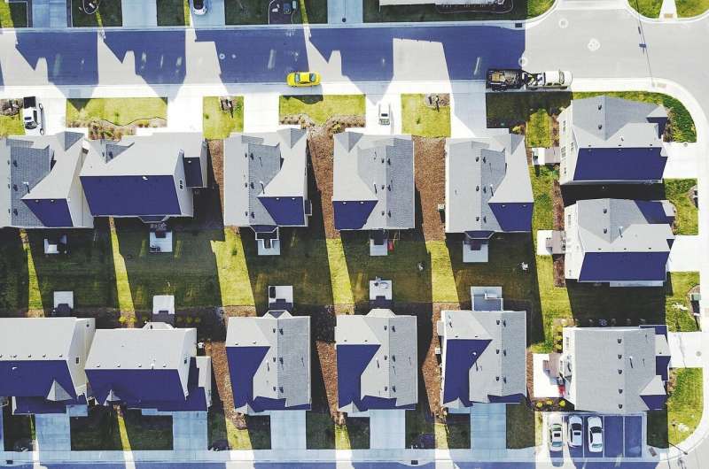 Unlocking Neighborhood Insights: How Building Footprints Reveal Socioeconomic Traits
