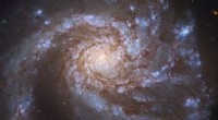 Hubble s Stunning Double Image Reveals M99’s Spiraling Beauty