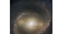 Hubble Captures Stunning Barred Spiral Galaxy M91 in Coma Berenices