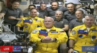 Three Russian Cosmonauts Arrive at the ISS in Yellow-Blue Suits