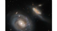 Hubble Captures the Dramatic Interaction of Galaxies Arp 298