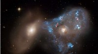 New Hubble Image Reveals Triangular Star-Forming Region from Colliding Galaxies