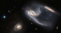 Hubble Discovers Starship-Shaped Galactic Duo in NGC 7764A