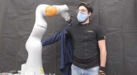 AI-Powered Robotics: Dressing Humans with Limited Vision