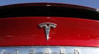 Tesla Reports Record Profits, Pauses New Model Production in 2022